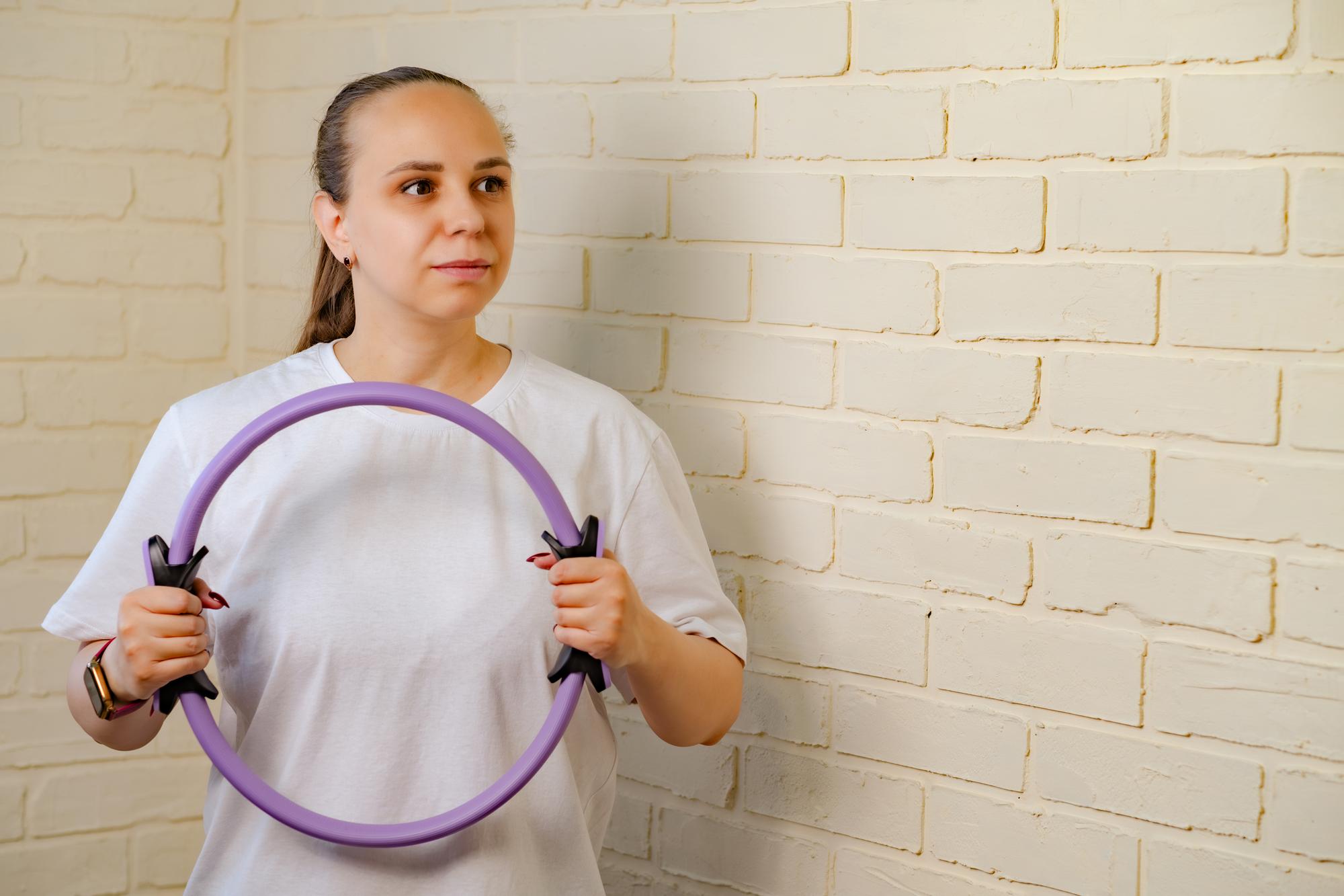 Portrait of lead instructor with embroidered hoop